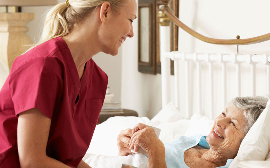 Miracle Care Agency's Residential Service Agency In Home Care photo with nurse or caregiver sitting with patient